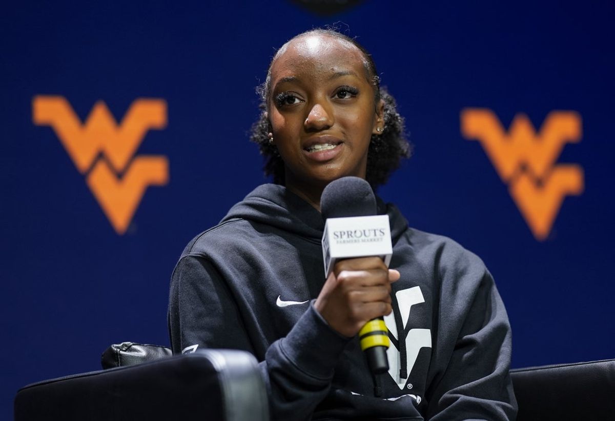 Oct 22, 2024; Kansas City, MO, USA; West Virginia Mountaineers guard Jordan Harrison (10) talks to media during Big 12 Women’s Basketball Media Day at T-Mobile Center. Mandatory Credit: Jay Biggerstaff-Imagn Images