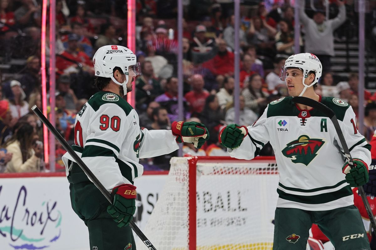Oct 22, 2024; Sunrise, Florida, USA; Minnesota Wild center Marcus Johansson (90) celebrates with center Joel Eriksson Ek (14) after scoring against the Florida Panthers during the first period at Amerant Bank Arena. Mandatory Credit: Sam Navarro-Imagn Images