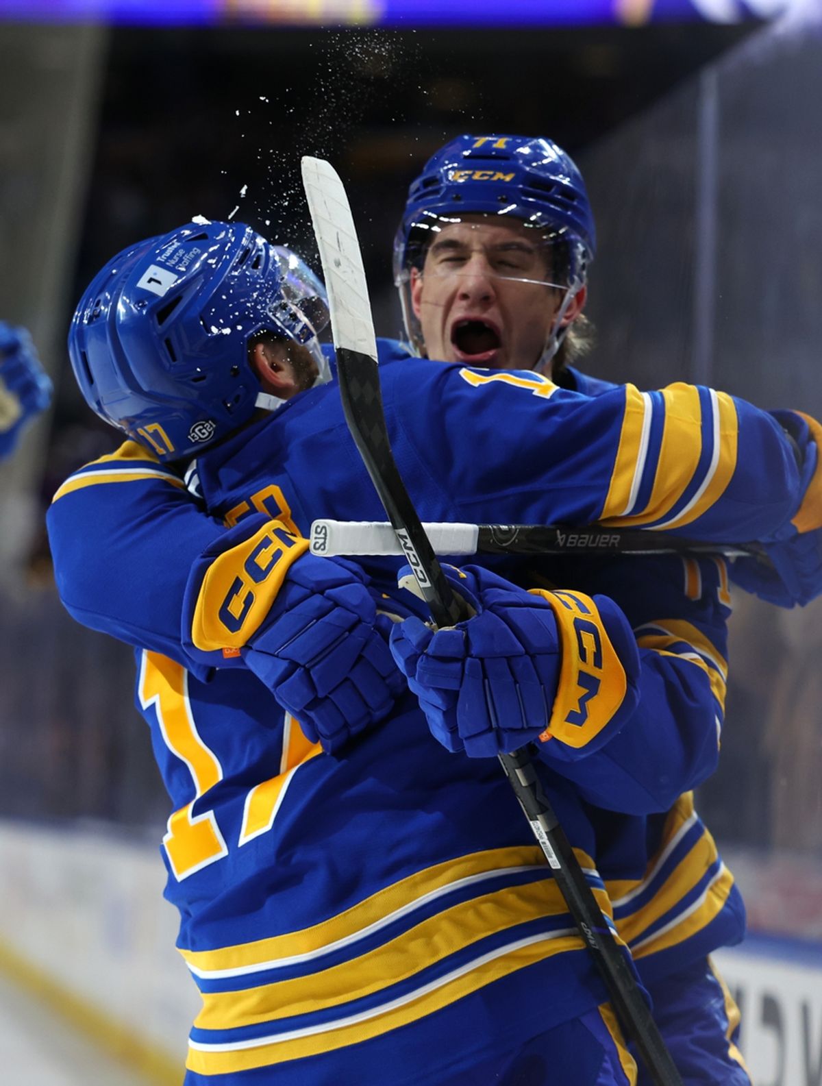 Oct 22, 2024; Buffalo, New York, USA;  Buffalo Sabres center Ryan McLeod (71) celebrates his goal with left wing Jason Zucker (17) during the second period against the Dallas Stars at KeyBank Center. Mandatory Credit: Timothy T. Ludwig-Imagn Images