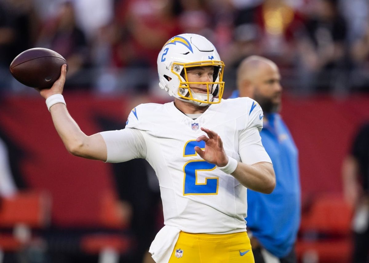 Oct 21, 2024; Glendale, Arizona, USA; Los Angeles Chargers quarterback Easton Stick (2) against the Arizona Cardinals at State Farm Stadium. Mandatory Credit: Mark J. Rebilas-Imagn Images