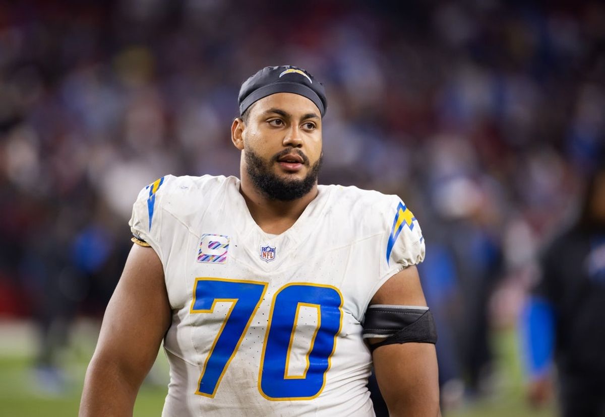 Oct 21, 2024; Glendale, Arizona, USA; Los Angeles Chargers offensive tackle Rashawn Slater (70) against the Arizona Cardinals at State Farm Stadium. Mandatory Credit: Mark J. Rebilas-Imagn Images