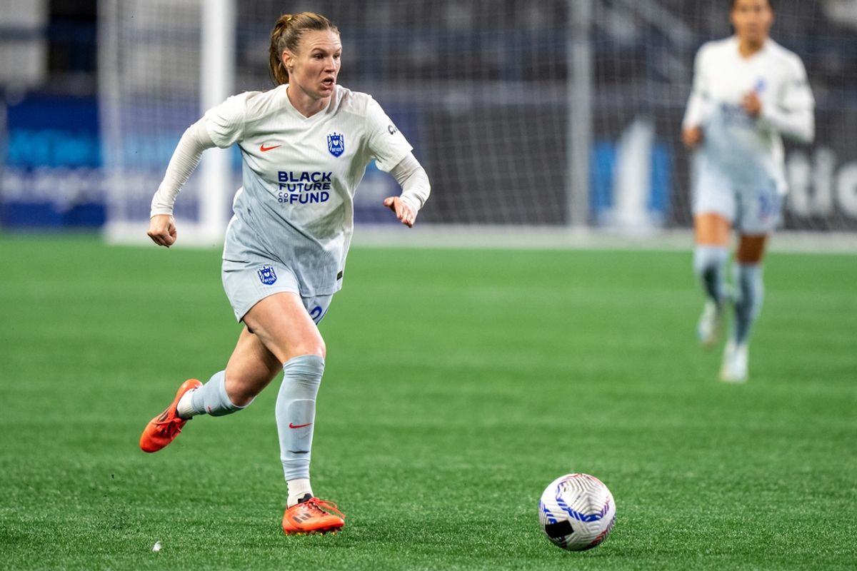 Oct 18, 2024; Seattle, Washington, USA;  Seattle Reign forward Veronica Latsko (24) dribbles the ball against the Houston Dash at Lumen Field. Mandatory Credit: Stephen Brashear-Imagn Images