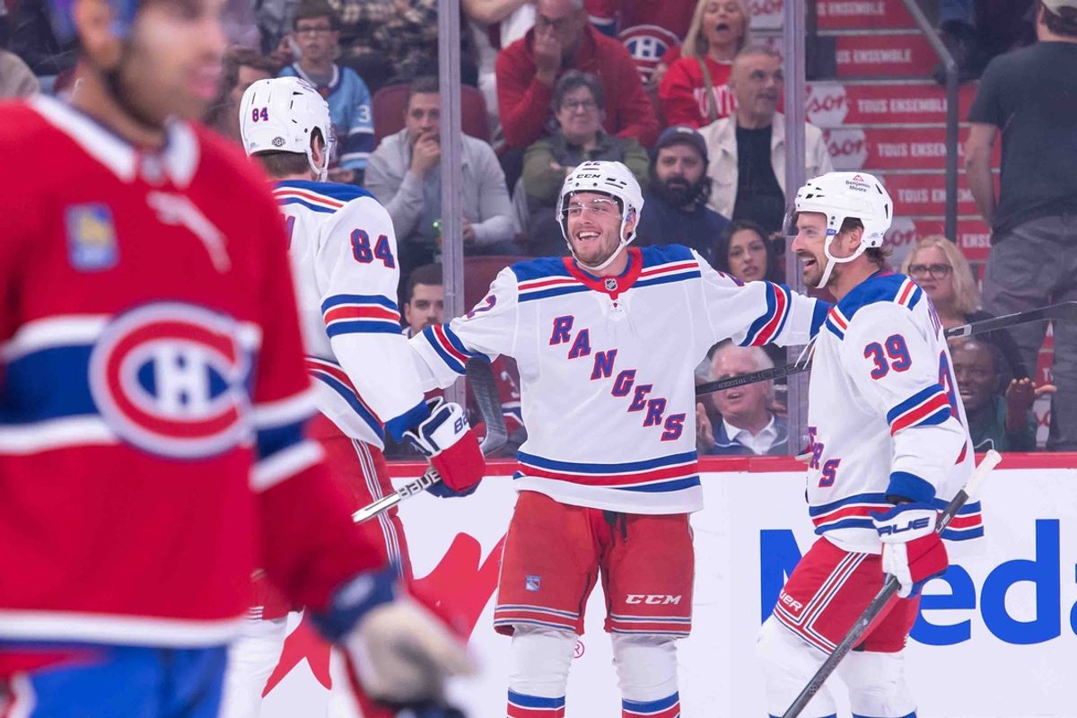 Oct 22, 2024; Ottawa, Ontario, CAN; New York Rangers center Filip Chytil (72) celebrates with center Adam Edstrom and center Sam Carrick (39) his goal scored in hte first period against the Montreal Canadiens at the Bell Centre. Mandatory Credit: Marc DesRosiers-Imagn Images