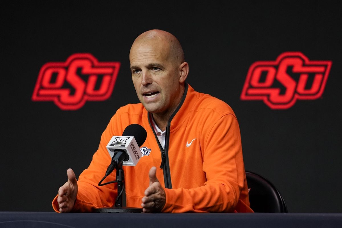 Oct 23, 2024; Kansas City, MO, USA; Oklahoma State Cowboys head coach Steve Lutz talks to media during the Big 12 Men’s Basketball Media Day at T-Mobile Center. Mandatory Credit: Jay Biggerstaff-Imagn Images