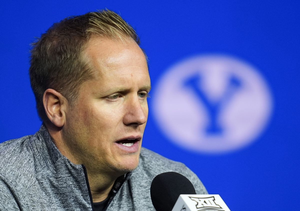 Oct 23, 2024; Kansas City, MO, USA; Brigham Young Cougars head coach Kevin Young talks to media during the Big 12 Men’s Basketball Media Day at T-Mobile Center. Mandatory Credit: Jay Biggerstaff-Imagn Images