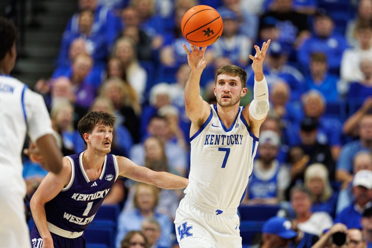 Oct 23, 2024; Lexington, KY, USA; Kentucky Wildcats forward Andrew Carr (7) passes the ball during the first half against the Kentucky Wesleyan Panthers at Rupp Arena at Central Bank Center. Mandatory Credit: Jordan Prather-Imagn Images
