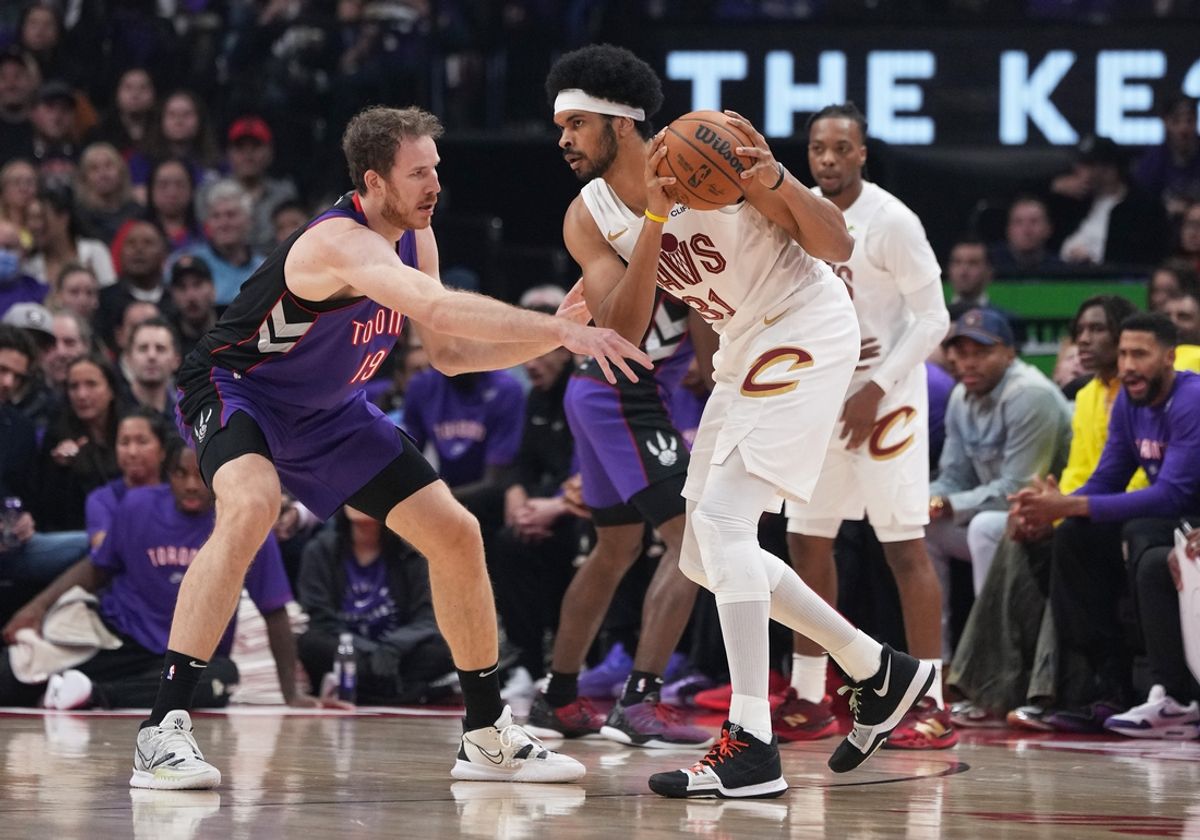 Oct 23, 2024; Toronto, Ontario, CAN; Cleveland Cavaliers center Jarrett Allen (31) controls the ball as Toronto Raptors center Jakob Poeltl (19) defends during the first quarter at Scotiabank Arena. Mandatory Credit: Nick Turchiaro-Imagn Images