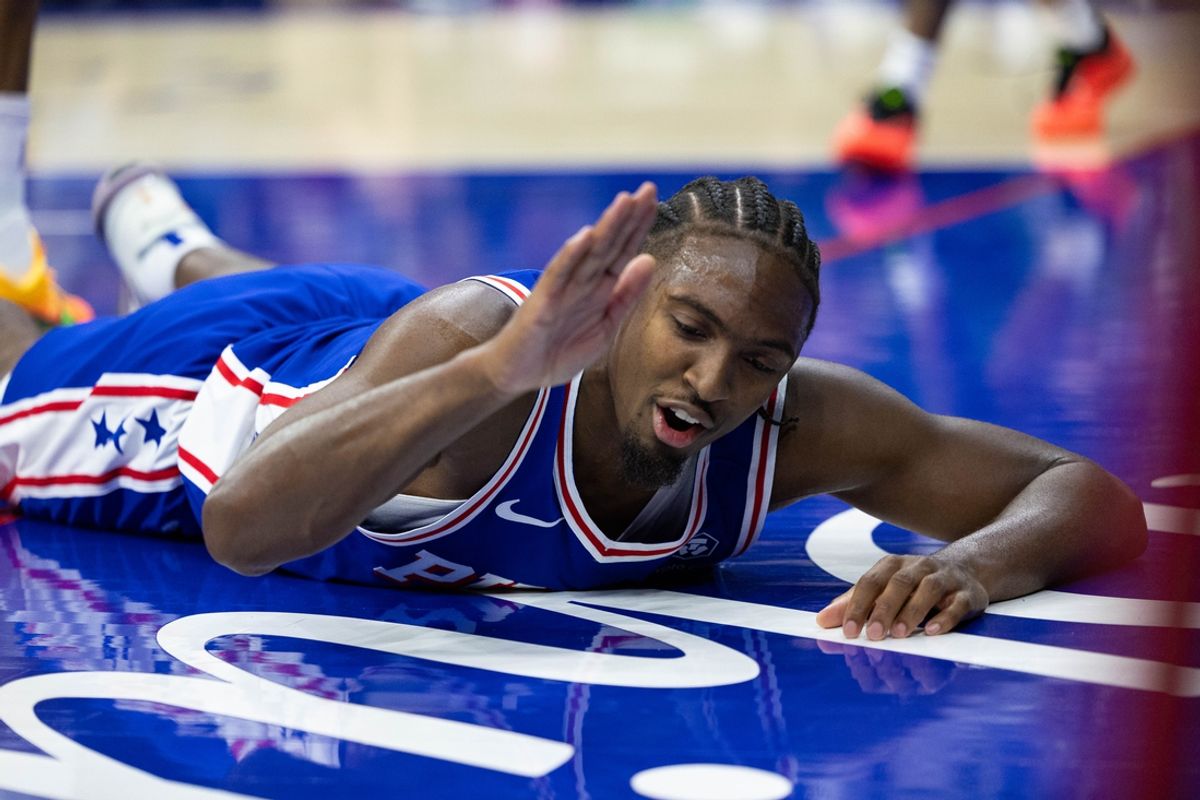 Oct 23, 2024; Philadelphia, Pennsylvania, USA; Philadelphia 76ers guard Tyrese Maxey (0) reacts after falling to the floor after a drive against the Milwaukee Bucks during the fourth quarter at Wells Fargo Center. Mandatory Credit: Bill Streicher-Imagn Images