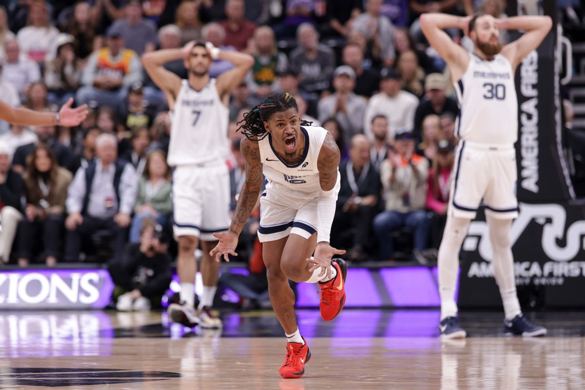 Oct 23, 2024; Salt Lake City, Utah, USA; Memphis Grizzlies guard Ja Morant (12) reacts to being called for a foul during the second half against the Utah Jazz at Delta Center. Mandatory Credit: Chris Nicoll-Imagn Images