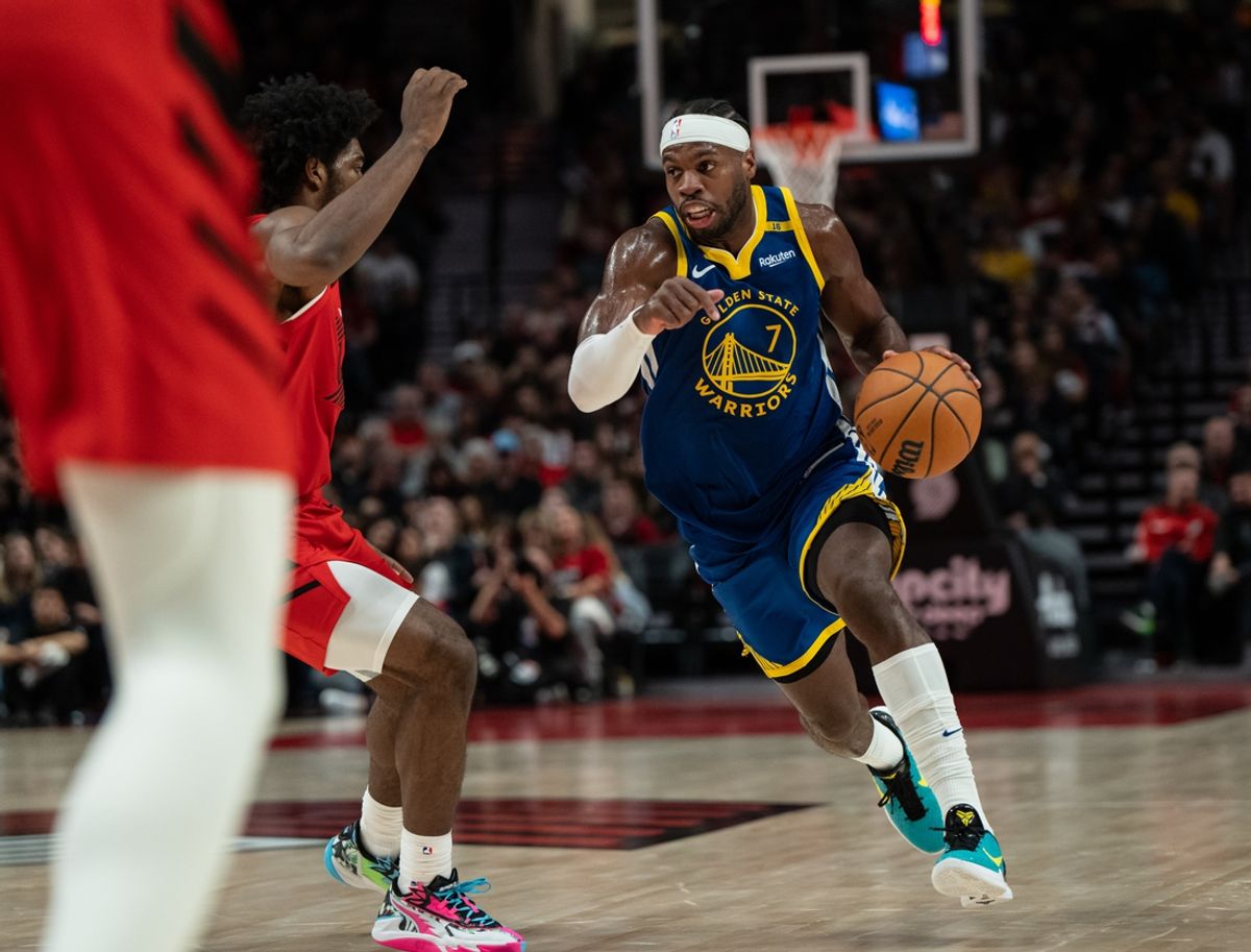 Oct 23, 2024; Portland, Oregon, USA;  Golden State Warriors shooting guard Buddy Hield (7) dribbles the ball during the second half against the Portland Trailblazers at Moda Center. Mandatory Credit: Stephen Brashear-Imagn Images