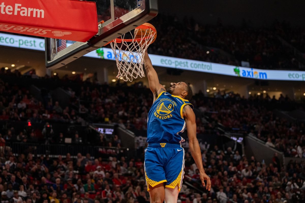 Oct 23, 2024; Portland, Oregon, USA;  Golden State Warriors shooting guard De'Anthony Melton (8) dunks the ball during the second half against the Portland Trailblazers at Moda Center. Mandatory Credit: Stephen Brashear-Imagn Images