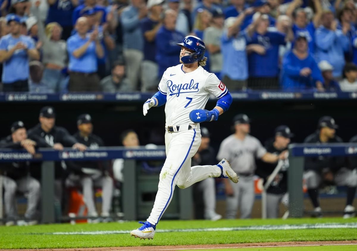 Oct 10, 2024; Kansas City, Missouri, USA; Kansas City Royals shortstop Bobby Witt Jr. (7) scores a run during the sixth inning against the New York Yankees in game four of the ALDS for the 2024 MLB Playoffs at Kauffman Stadium. Mandatory Credit: Jay Biggerstaff-Imagn Images