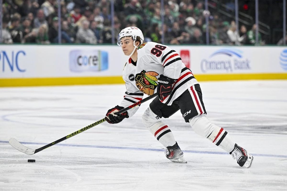 Dec 31, 2023; Dallas, Texas, USA; Chicago Blackhawks center Connor Bedard (98) in action during the game between the Dallas Stars and the Chicago Blackhawks at the American Airlines Center.