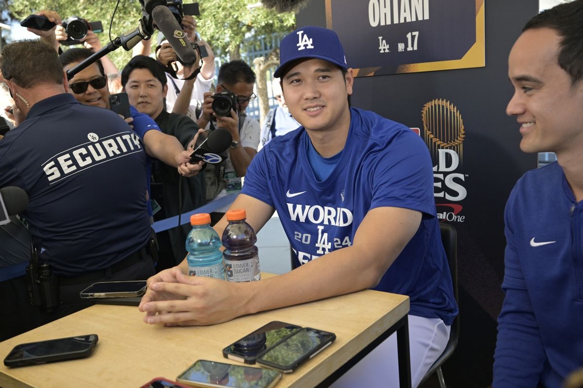 Oct 24, 2024; Los Angeles, CA, USA;  Los Angeles Dodgers designated hitter Shohei Ohtani (17) answers questions during media day prior to game one of the World Series against the New York Yankees at Dodger Stadium. Mandatory Credit: Jayne Kamin-Oncea-Imagn Images