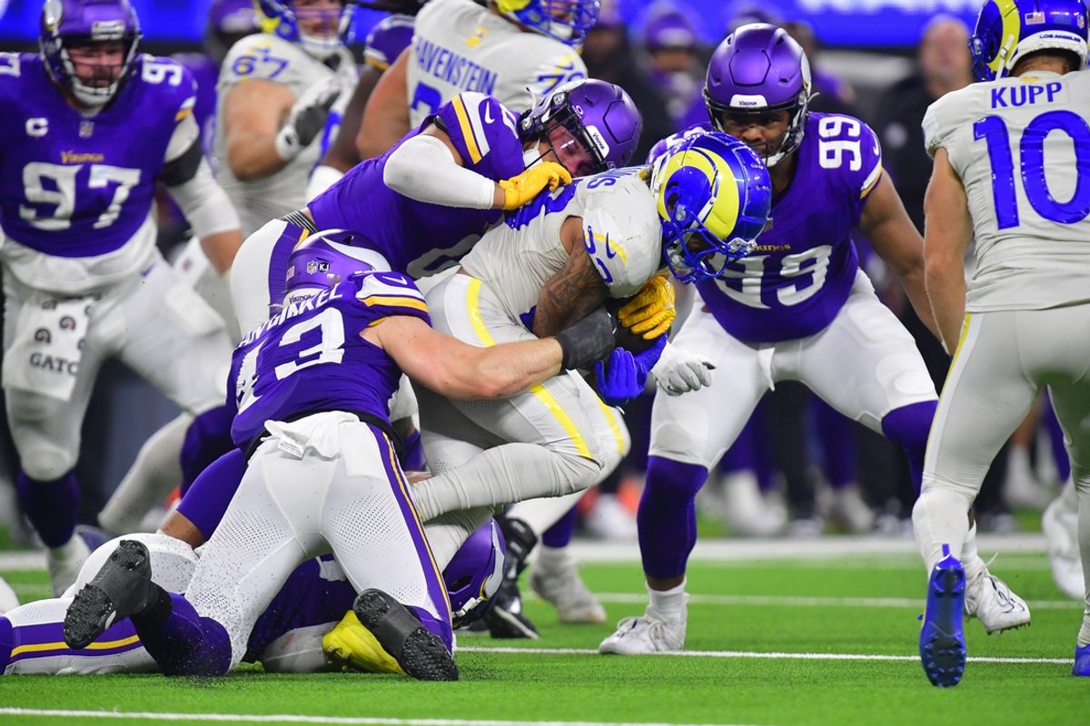 Oct 24, 2024; Inglewood, California, USA; Los Angeles Rams running back Kyren Williams (23) is brought down by Minnesota Vikings linebacker Ivan Pace Jr. (0) and linebacker Andrew Van Ginkel (43) during the first half at SoFi Stadium. Mandatory Credit: Gary A. Vasquez-Imagn Images