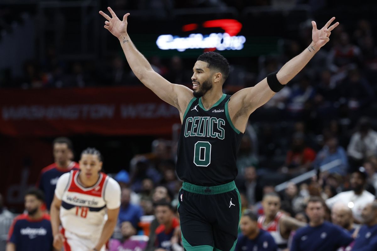 Oct 24, 2024; Washington, District of Columbia, USA; Boston Celtics forward Jayson Tatum (0) celebrates on the court against the Washington Wizards in the second half at Capital One Arena. Mandatory Credit: Geoff Burke-Imagn Images