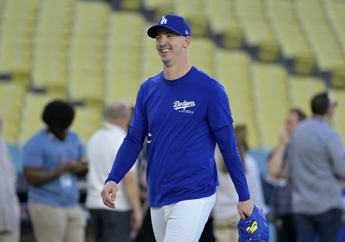 Oct 24, 2024; Los Angeles, CA, USA;  Los Angeles Dodgers starting pitcher Walker Buehler (21) during the team workout prior to game one of the World Series against the New York Yankees at Dodger Stadium. Mandatory Credit: Jayne Kamin-Oncea-Imagn Images