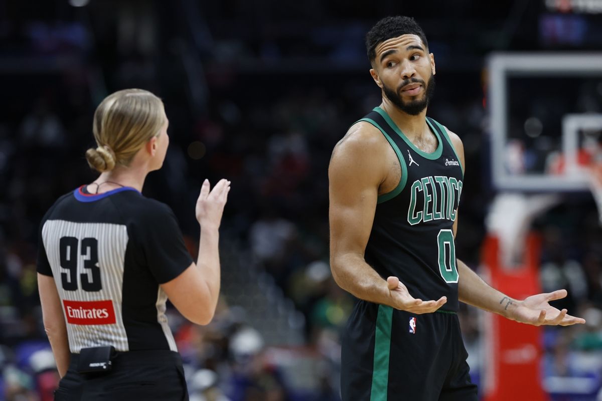 Oct 24, 2024; Washington, District of Columbia, USA; Boston Celtics forward Jayson Tatum (0) argues a call with referee Jenna Reneau (93) against the Washington Wizards in the first half at Capital One Arena. Mandatory Credit: Geoff Burke-Imagn Images