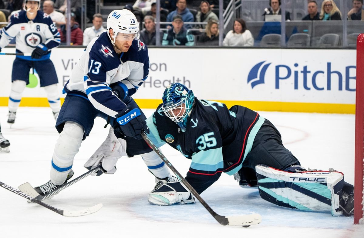 Oct 24, 2024; Seattle, Washington, USA;  Winnipeg Jets forward Gabriel Vilardi (13) scores a goal against  goalie Joey Daccord (35) during the second period at Climate Pledge Arena. Mandatory Credit: Stephen Brashear-Imagn Images