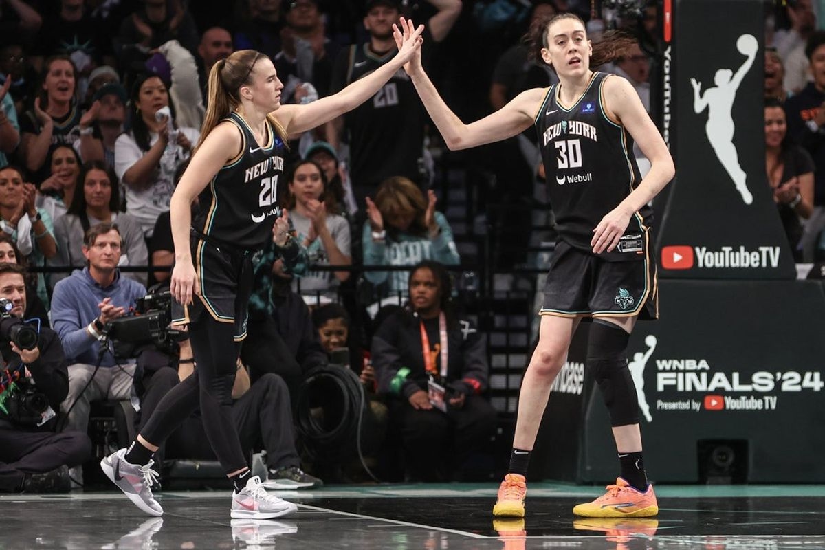 Oct 20, 2024; Brooklyn, New York, USA; New York Liberty guard Sabrina Ionescu (20) and forward Breanna Stewart (30) during game five of the 2024 NBA Finals at Barclays Center. Mandatory Credit: Wendell Cruz-Imagn Images