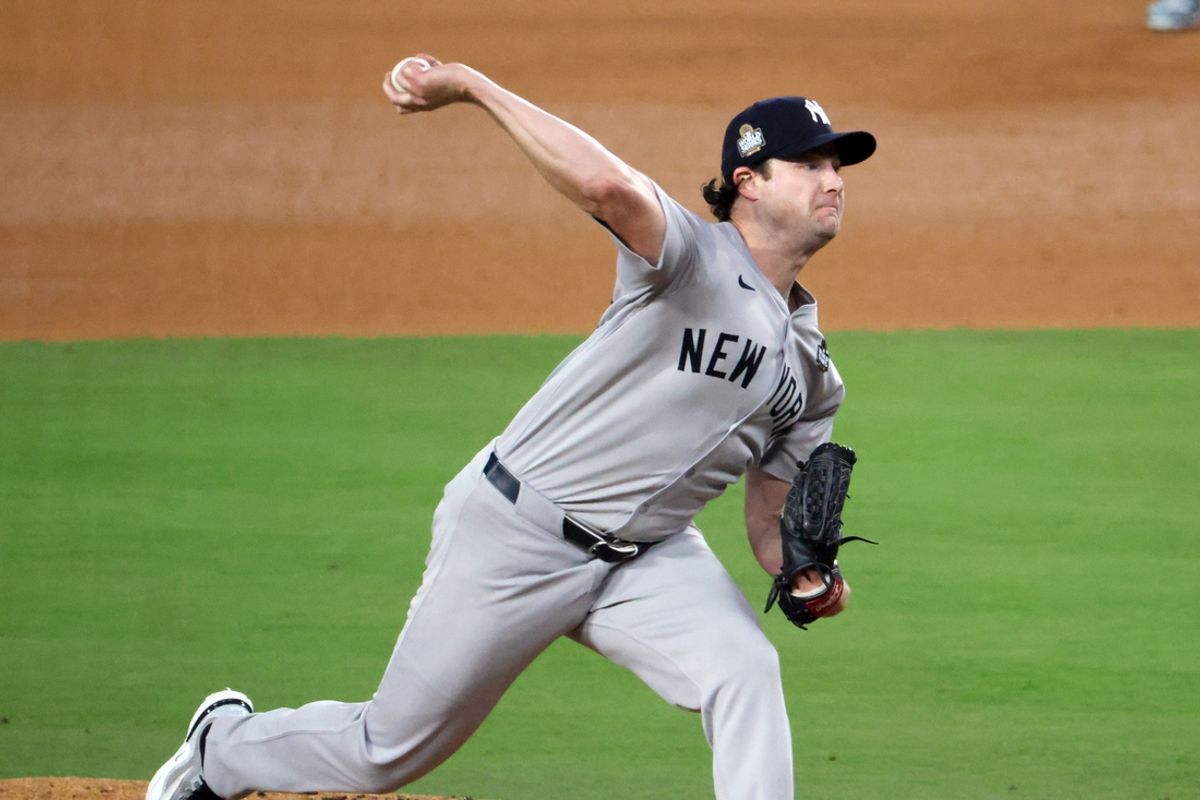 Oct 25, 2024; Los Angeles, California, USA; New York Yankees pitcher Gerrit Cole (45) pitches in the fourth inning agains the Los Angeles Dodgers during game one of the 2024 MLB World Series at Dodger Stadium. Mandatory Credit: Kiyoshi Mio-Imagn Images