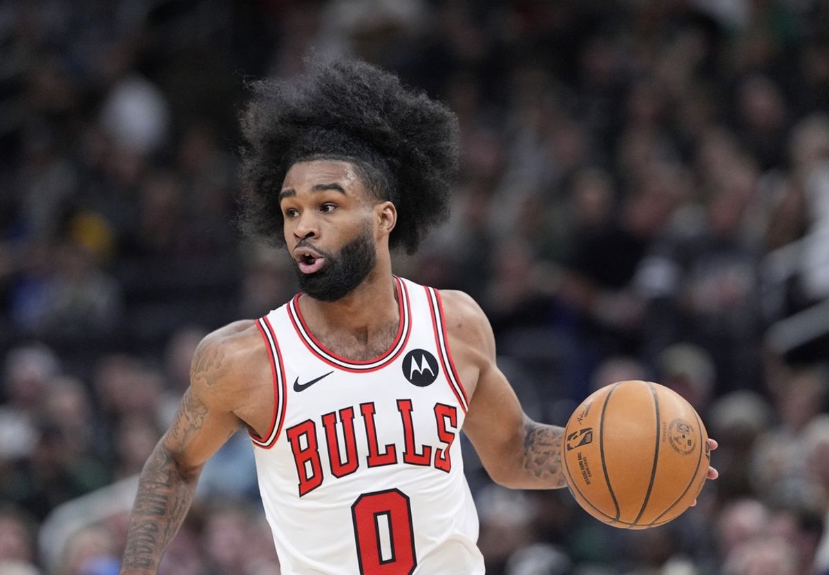 Oct 25, 2024; Milwaukee, Wisconsin, USA; Chicago Bulls guard Coby White (0) pushes the ball up the court against the Milwaukee Bucks own the first half at Fiserv Forum. Mandatory Credit: Michael McLoone-Imagn Images