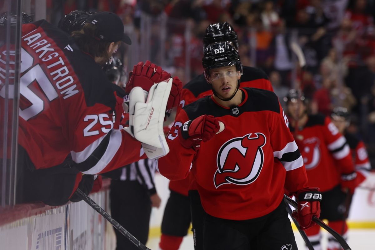 Oct 25, 2024; Newark, New Jersey, USA; New Jersey Devils left wing Jesper Bratt (63) celebrates his goal against the New York Islanders during the third period at Prudential Center. Mandatory Credit: Ed Mulholland-Imagn Images