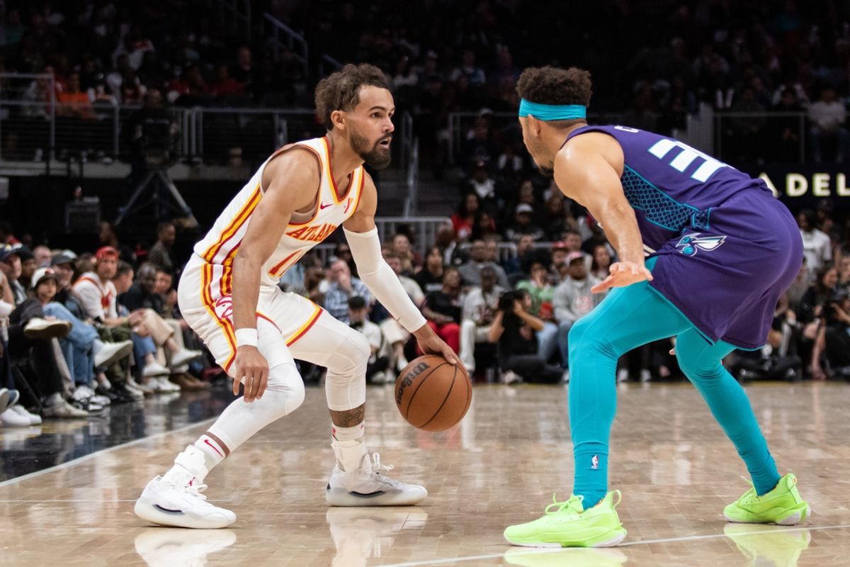 Oct 25, 2024; Atlanta, Georgia, USA; Charlotte Hornets guard Seth Curry (30) plays defense against Atlanta Hawks guard Trae Young (11) during the fourth quarter at State Farm Arena. Mandatory Credit: Jordan Godfree-Imagn Images