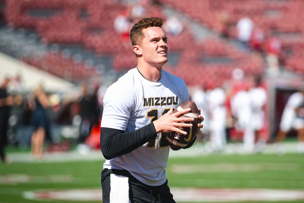 Missouri Tigers quarterback Brady Cook (12) warms up before the game against the Alabama Crimson Tide at Bryant-Denny Stadium. Mandatory Credit: William McLelland-Imagn Images