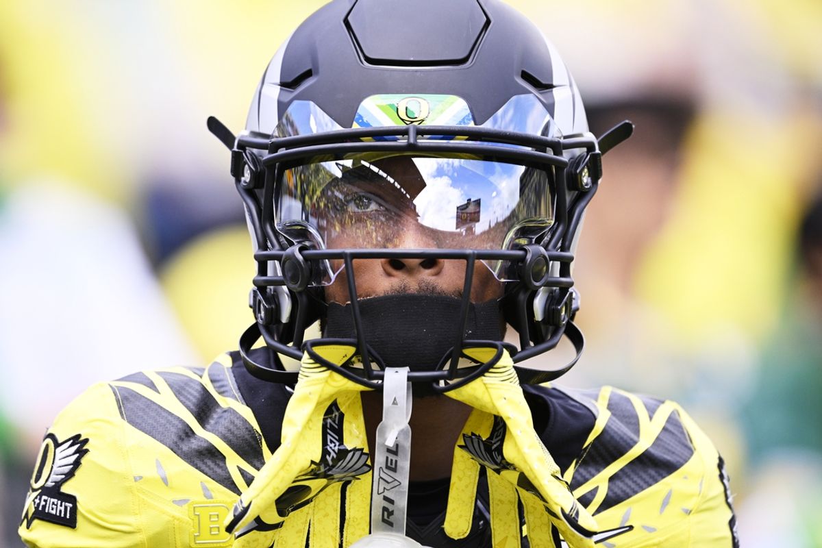 Oct 26, 2024; Eugene, Oregon, USA; Oregon Ducks wide receiver Tez Johnson (15) looks up during warm ups before a game against the Illinois Fighting Illini at Autzen Stadium. Mandatory Credit: Troy Wayrynen-Imagn Images