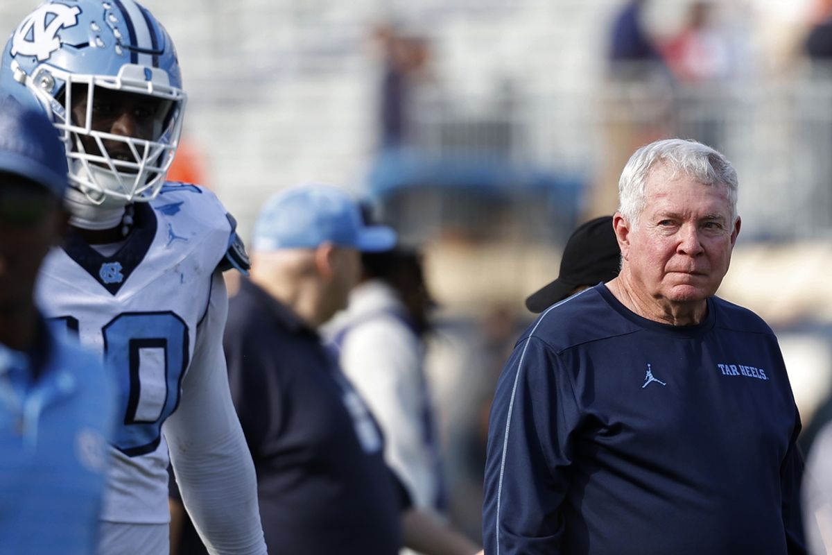 Oct 26, 2024; Charlottesville, Virginia, USA; North Carolina Tar Heels head coach Mack Brown walks off the field after the Tar Heels' game against the Virginia Cavaliers at Scott Stadium. Mandatory Credit: Geoff Burke-Imagn Images