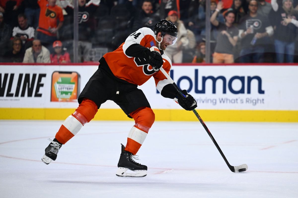 Oct 26, 2024; Philadelphia, Pennsylvania, USA; Philadelphia Flyers center Sean Couturier (14) scores an open-net hat trick goal against the Minnesota Wild in the third period at Wells Fargo Center. Mandatory Credit: Kyle Ross-Imagn Images