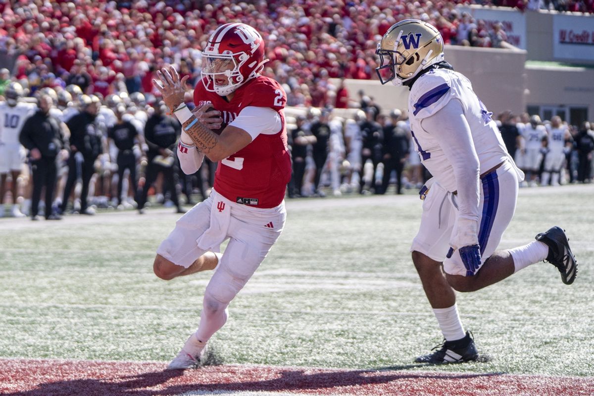 Oct 26, 2024; Bloomington, Indiana, USA; Indiana Hoosiers quarterback Tayven Jackson (2) runs the ball for a touchdown during the fourth quarter against the Washington Huskies at Memorial Stadium. Mandatory Credit: Jacob Musselman-Imagn Images