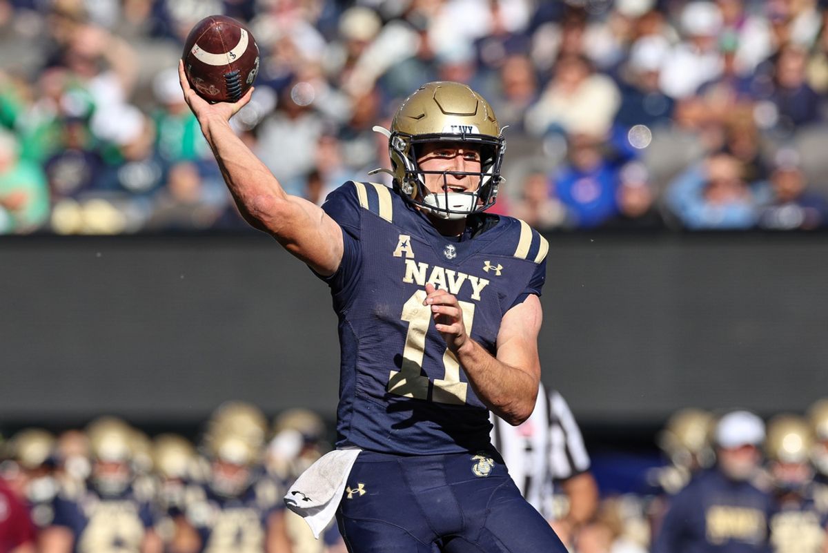 Oct 26, 2024; East Rutherford, New Jersey, USA; Navy Midshipmen quarterback Blake Horvath (11) passes the ball during the second half against the Notre Dame Fighting Irish at MetLife Stadium. Mandatory Credit: Vincent Carchietta-Imagn Images