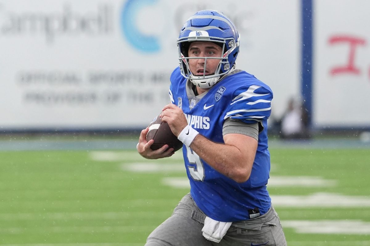 Memphis' Seth Henigan (9) runs with the ball during the game between Charlotte and the University of Memphis at Simmons Bank Liberty Stadium on Saturday, October 26, 2024.