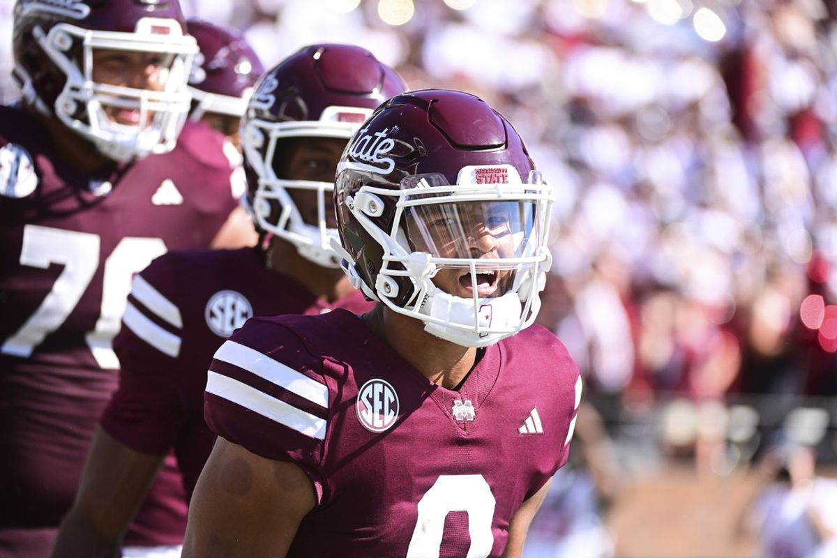 Oct 26, 2024; Starkville, Mississippi, USA; Mississippi State Bulldogs quarterback Michael Van Buren Jr. (0) reacts after a touchdown against the Arkansas Razorbacks during the third quarter at Davis Wade Stadium at Scott Field. Mandatory Credit: Matt Bush-Imagn Images