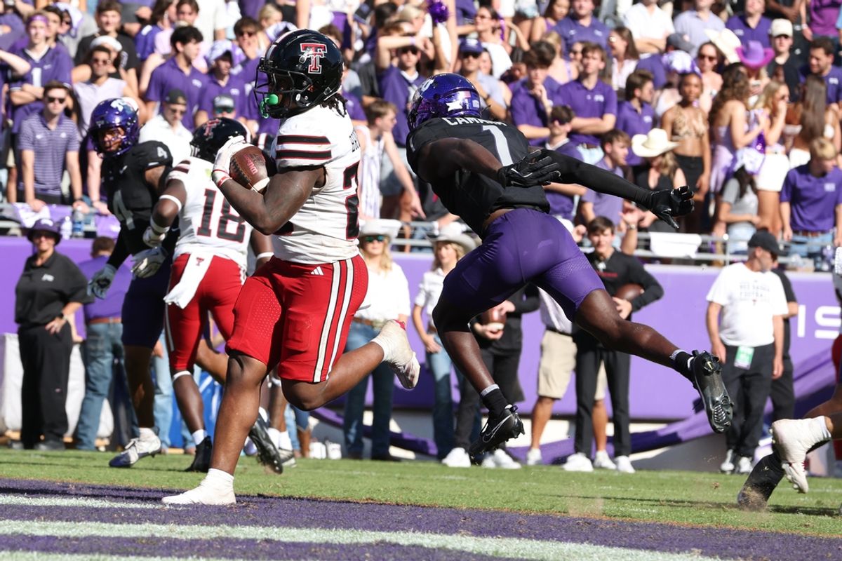 Oct 26, 2024; Fort Worth, Texas, USA;  Texas Tech Red Raiders running back Tahj Brooks (28) runs for a touchdown against the TCU Horned Frogs in the second quarter at Amon G. Carter Stadium. Mandatory Credit: Tim Heitman-Imagn Images