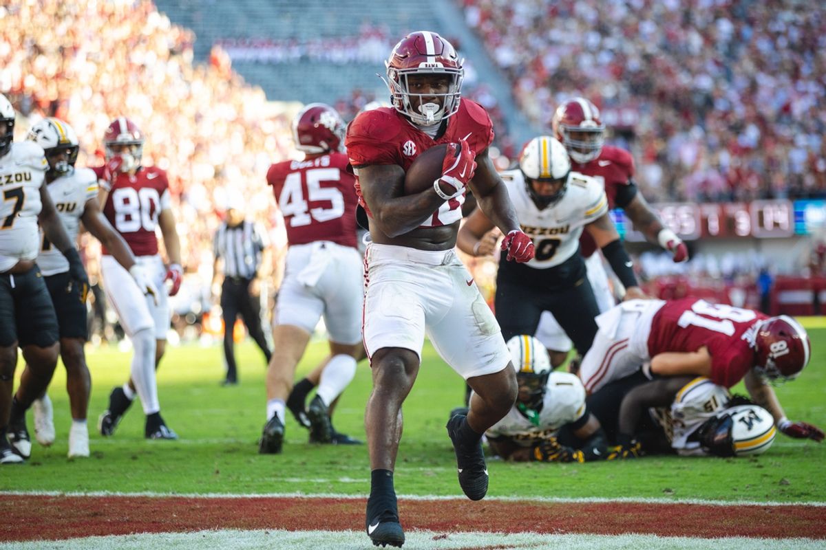 Oct 26, 2024; Tuscaloosa, Alabama, USA;  Alabama Crimson Tide running back Jam Miller (26) scores a touchdown against the Missouri Tigers during the second quarter at Bryant-Denny Stadium. Mandatory Credit: Will McLelland-Imagn Images