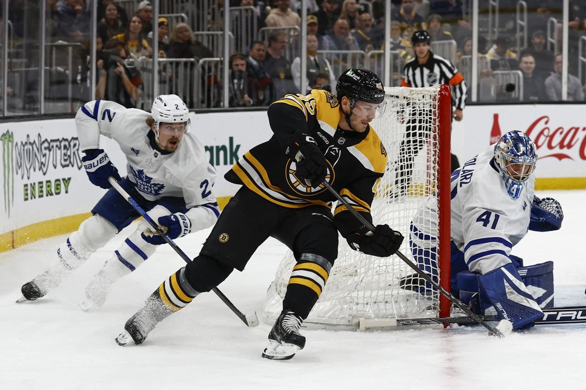 Oct 26, 2024; Boston, Massachusetts, USA; Boston Bruins left wing Cole Koepke (45) tries to stuff the puck past Toronto Maple Leafs goaltender Anthony Stolarz (41) slides over during the first period at TD Garden. Mandatory Credit: Winslow Townson-Imagn Images