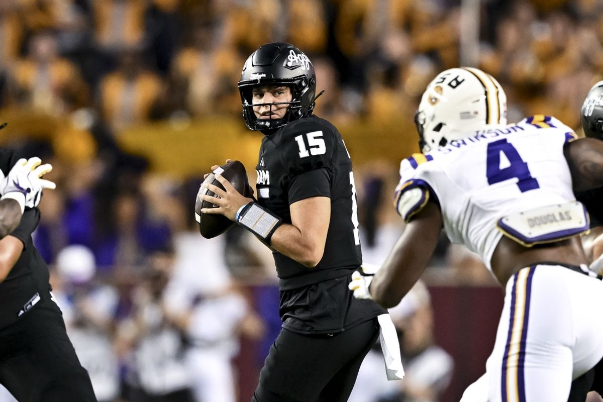 Oct 26, 2024; College Station, Texas, USA; Texas A&M Aggies quarterback Conner Weigman (15) looks to pass the ball during the first quarter against the LSU Tigers at Kyle Field. Mandatory Credit: Maria Lysaker-Imagn Images.