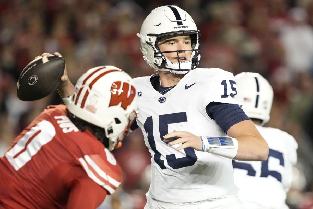 Oct 26, 2024; Madison, Wisconsin, USA;  Penn State Nittany Lions quarterback Drew Allar (15) throws a pass during the second quarter against the Wisconsin Badgers at Camp Randall Stadium. Mandatory Credit: Jeff Hanisch-Imagn Images