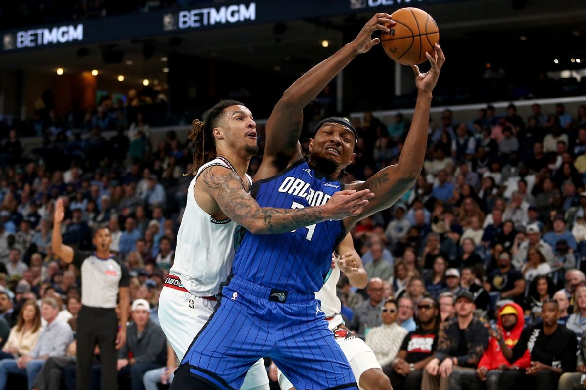 Oct 26, 2024; Memphis, Tennessee, USA; Memphis Grizzlies forward Brandon Clarke (left) and Orlando Magic center Wendell Carter Jr. (right) battle for a rebound during the first half at FedExForum. Mandatory Credit: Petre Thomas-Imagn Images