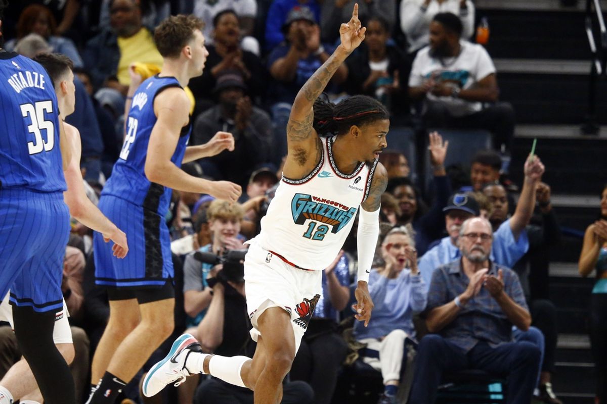 Oct 26, 2024; Memphis, Tennessee, USA; Memphis Grizzlies guard Ja Morant (12) reacts during the first half against the Orlando Magic at FedExForum. Mandatory Credit: Petre Thomas-Imagn Images