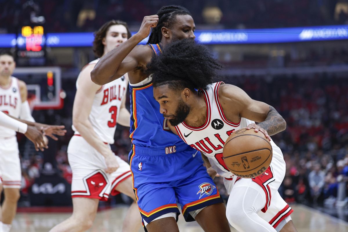 Oct 26, 2024; Chicago, Illinois, USA; Chicago Bulls guard Coby White (0) drives to the basket against the Oklahoma City Thunder during the first half at United Center. Mandatory Credit: Kamil Krzaczynski-Imagn Images
