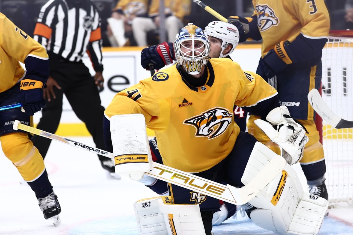 Oct 26, 2024; Nashville, Tennessee, USA; Nashville Predators goaltender Scott Wedgewood (41) watches as a puck is lobbed into the air in the second period at Bridgestone Arena. Mandatory Credit: Casey Gower-Imagn Images