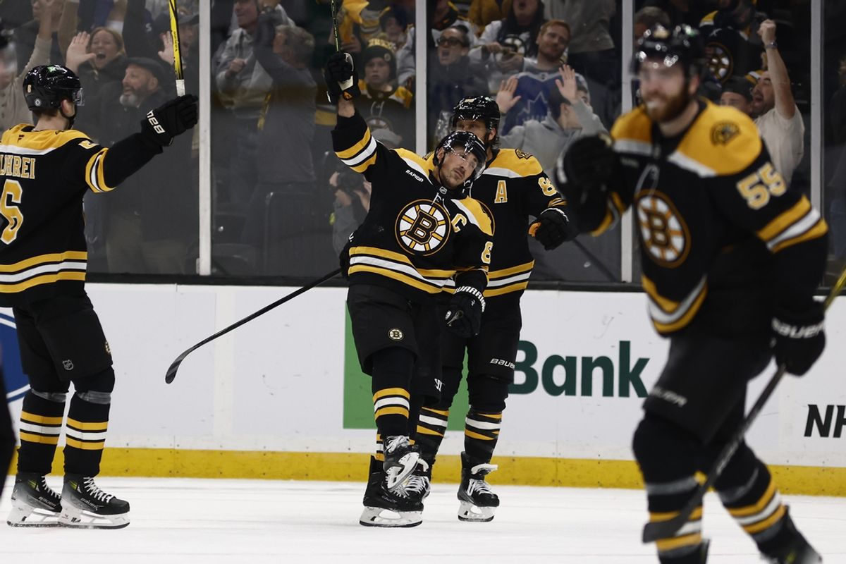 Oct 26, 2024; Boston, Massachusetts, USA; Boston Bruins left wing Brad Marchand (63) ccelebrates their overtime win against the Toronto Maple Leafs at TD Garden. Mandatory Credit: Winslow Townson-Imagn Images