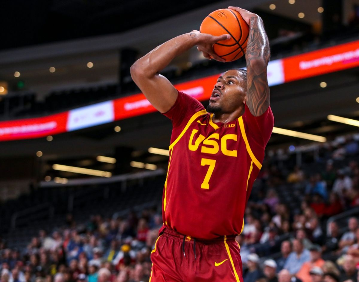 USC Trojans guard Chibuzo Agbo (7) shoots a three-pointer during the second half of their exhibition game at Acrisure Arena in Palm Desert, Calif., Saturday, Oct. 26, 2024.