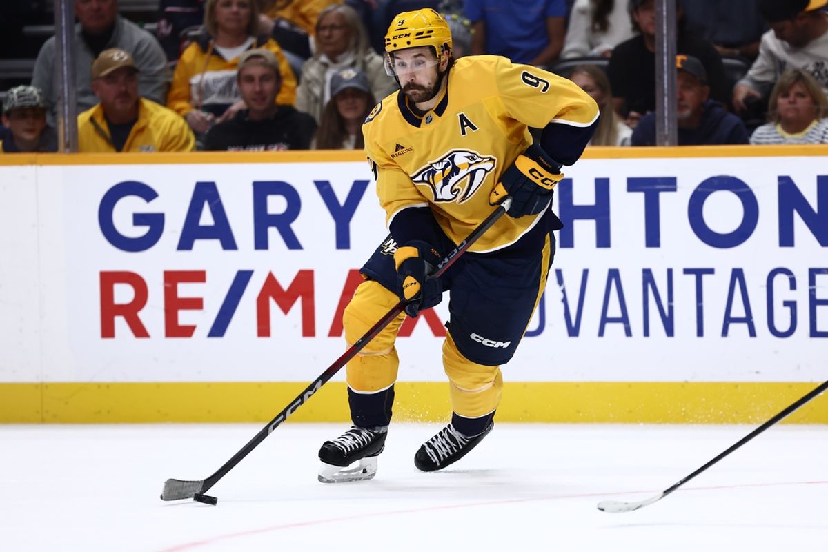 Oct 26, 2024; Nashville, Tennessee, USA; Nashville Predators left wing Filip Forsberg (9) drives the puck down the ice in the third period against the Columbus Blue Jackets at Bridgestone Arena. Mandatory Credit: Casey Gower-Imagn Images