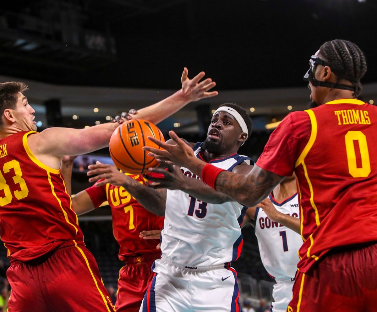 Gonzaga Bulldogs forward Graham Ike (13) competes for the ball with USC Trojans forwards Josh Cohen (33) and Saint Thomas (0) during the first half of their exhibition game at Acrisure Arena in Palm Desert, Calif., Saturday, Oct. 26, 2024.