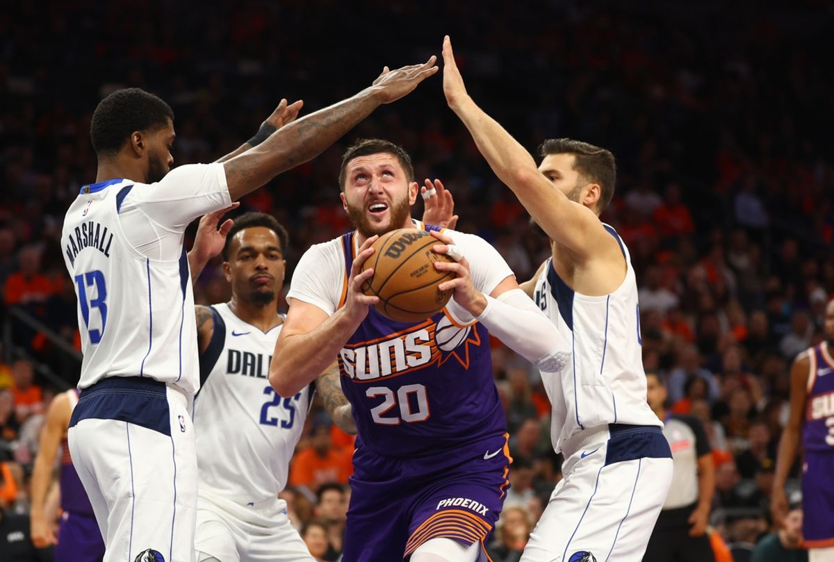 Oct 26, 2024; Phoenix, Arizona, USA; Phoenix Suns center Jusuf Nurkic (20) drives to the basket against the Dallas Mavericks in the first half of the home opener at Footprint Center. Mandatory Credit: Mark J. Rebilas-Imagn Images